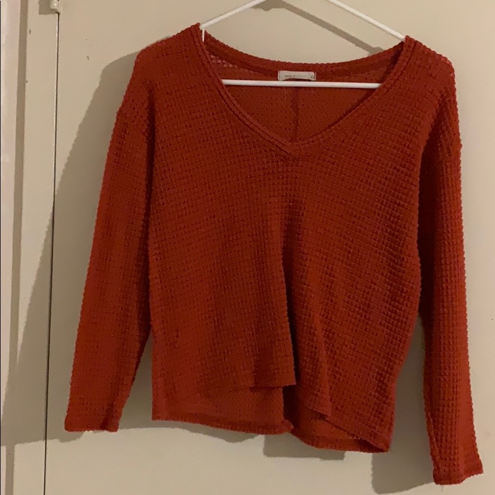 orange sweater